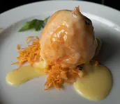 Shrimp balls with sweet sauce and orange peel