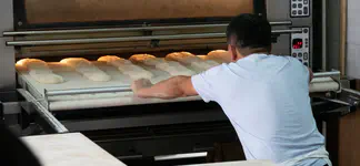 putting the foccacia in the oven