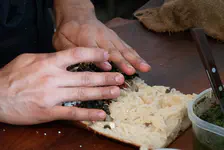 Assembling a foccacia sandwich