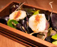 "Ice Cream Bean" filled with avocado puree topped with chilis