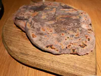 House made roti, maybe blue corn?
