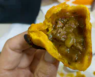 The insides of a salteña.