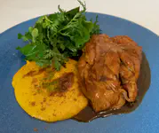 Roasted goat with carob bean sauce and roasted pumpkin (except ours was with choclo pipian and green salad)