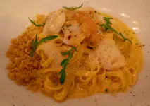With sea urchin, crispy bread crumbs, langoustine?, and butter