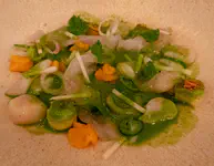 Tiradito of lemon sole and scallops. The sauce is much greener than expected, and the sweet potatoes are piped and there are sliced butter beans instead of choclo (corn)