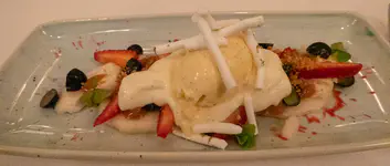 Fresh strawberries, blueberries, and cherimoya; custard, lucuma(?) ice cream, and merinque batons.